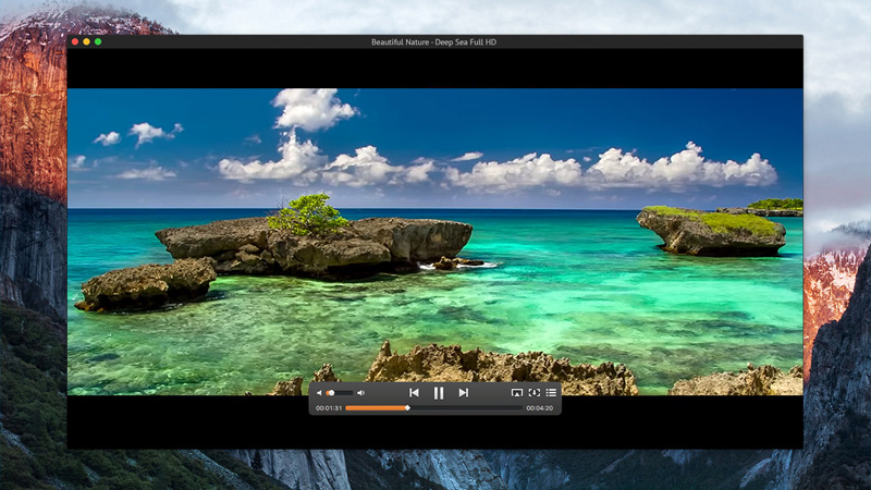 Video file depicting a beautiful ocean with mossy rocks.